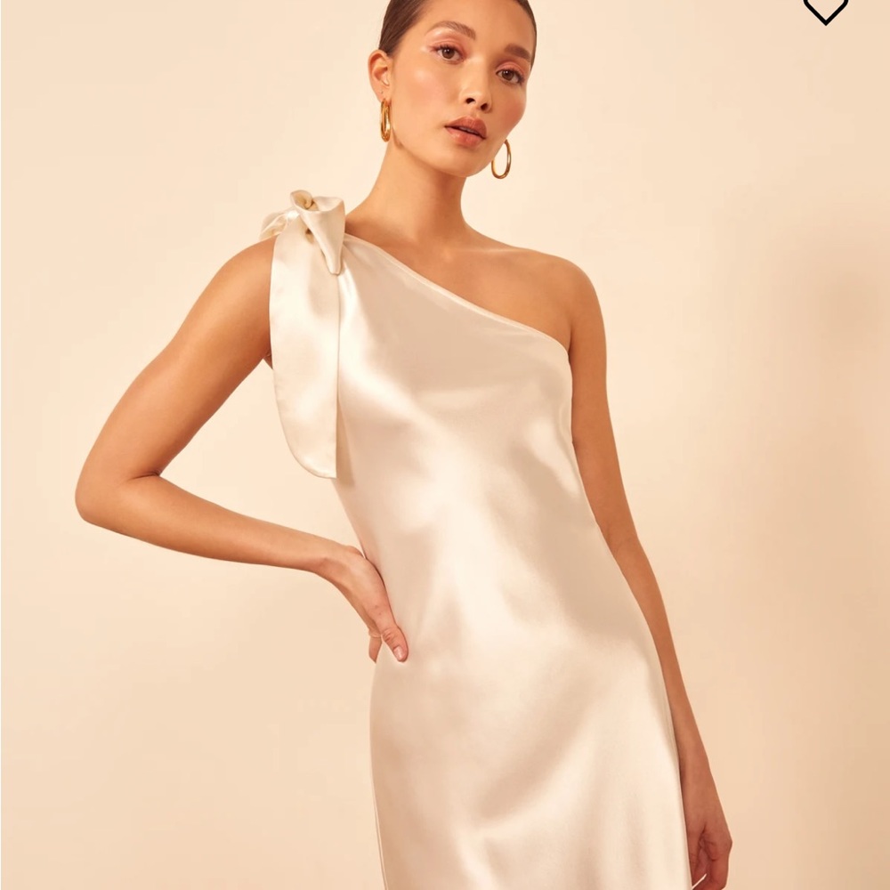 Reformation ivory, one shoulder silk dress. Size small. Never worn, tags on